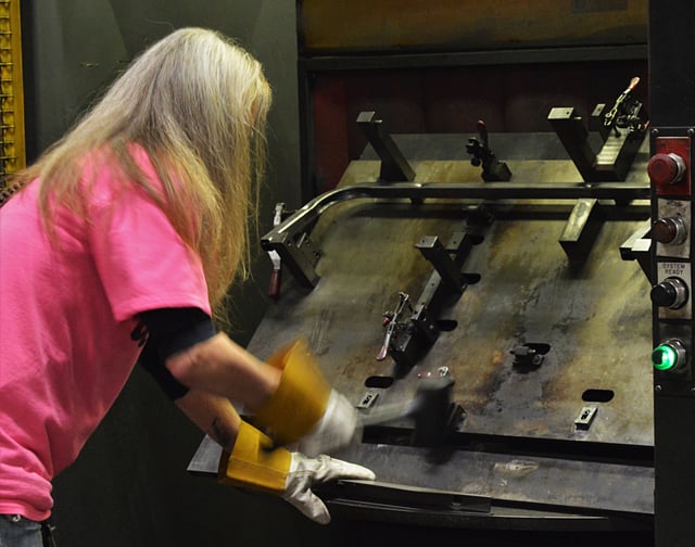 Engineer operating a metal forming machining