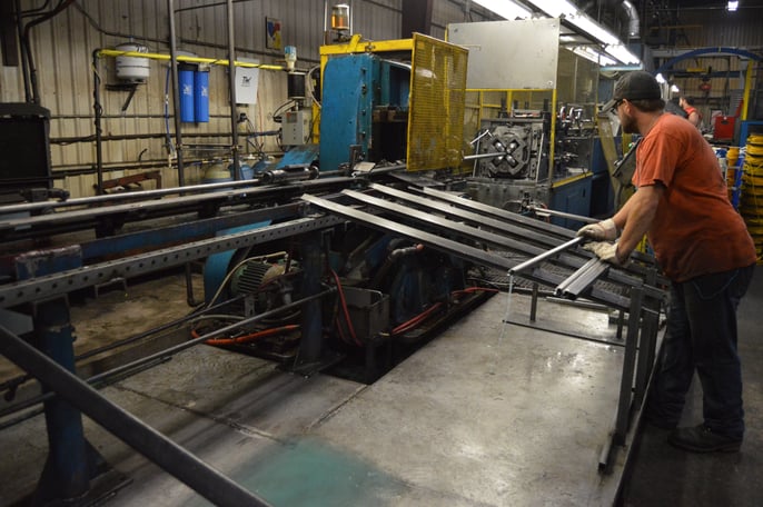 Engineer working with aluminum tubing