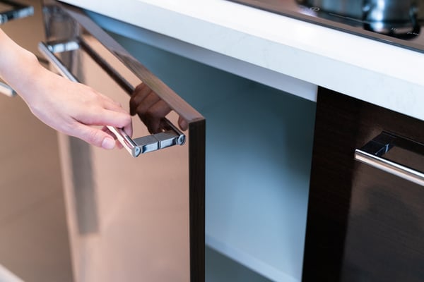 A steel handle on a modern appliance