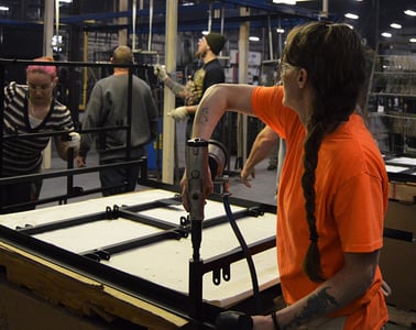 powder coating a tube on a table