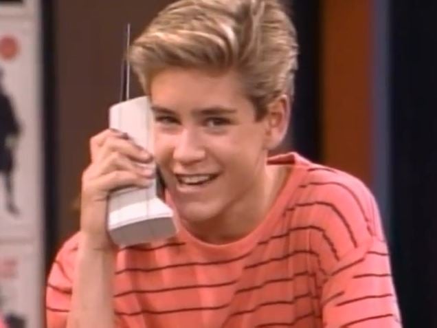 Zack Morris (Saved By the Bell) using a dated cell phone