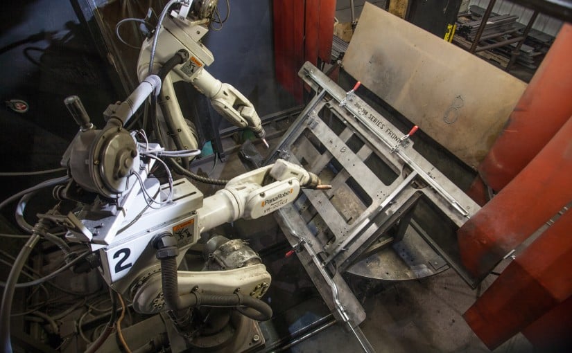 Robotic welding machine welding a bed frame